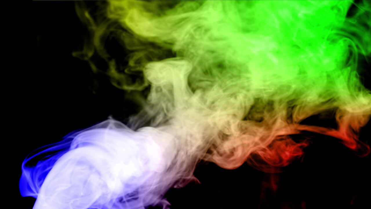 Flussi di vapore o fumo dai colori vivaci su uno sfondo scuro