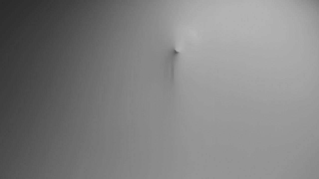 A scary silhouette of a woman appears screaming from the white wall