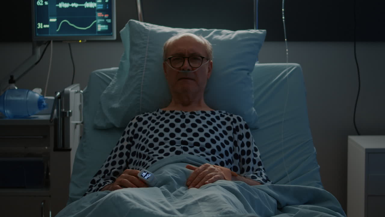 Patient with disease laying in hospital ward bed at clinic