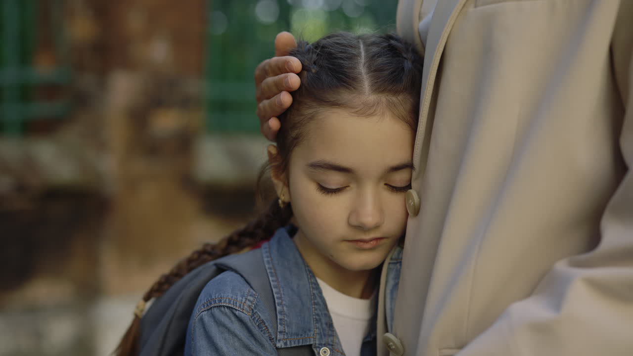 A comforting moment between a parent and child