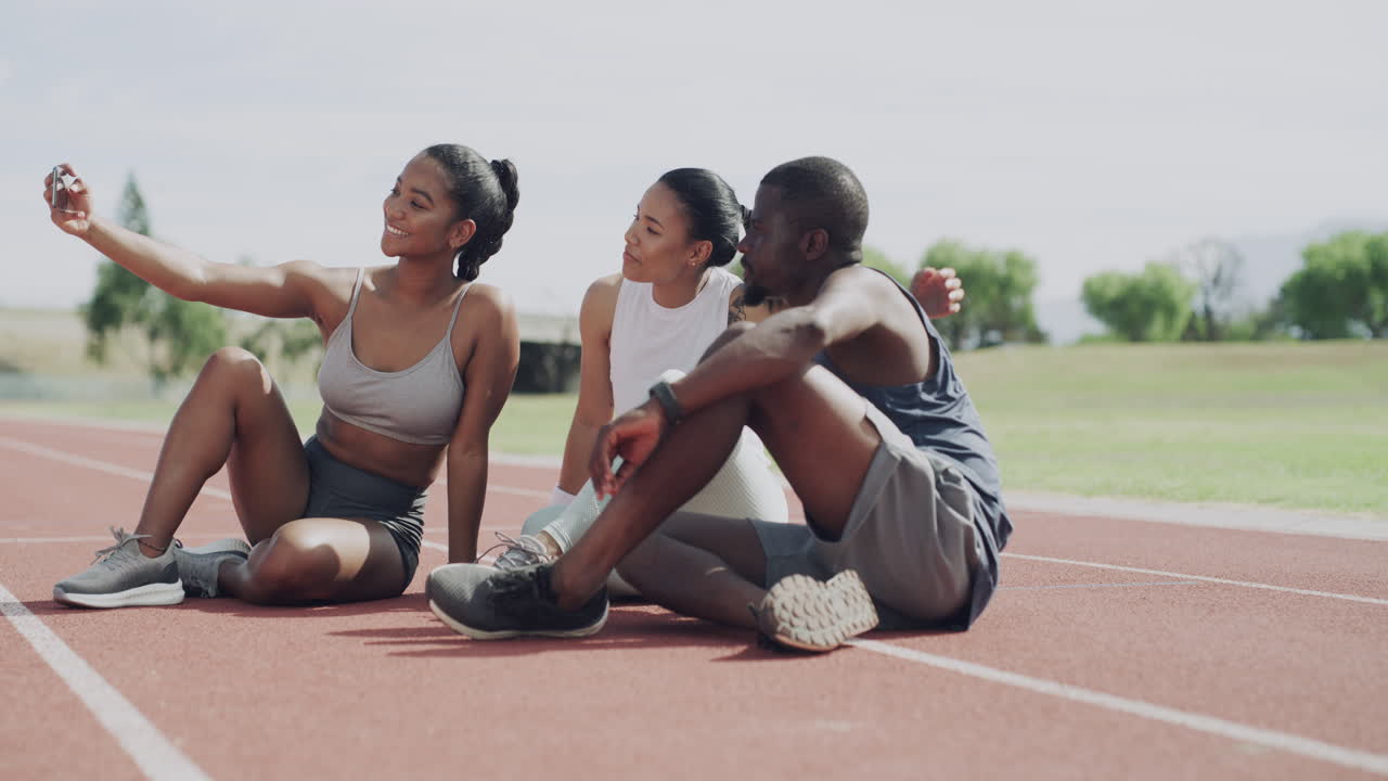 Friends Taking a Selfie on a Track