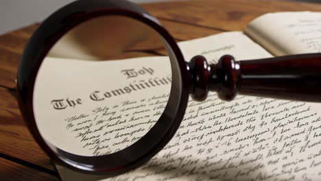 magnifying glass on an old constitution