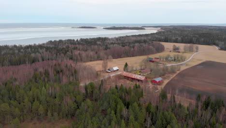 cosy little farm situated in swedish landscape surrounded by forest and the sea