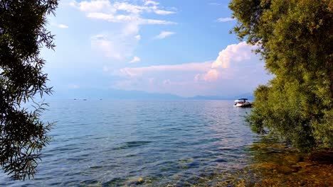 Still-shot-of-a-boat-on-blue-water-of-Ohrid-Lake-in-Macedonia