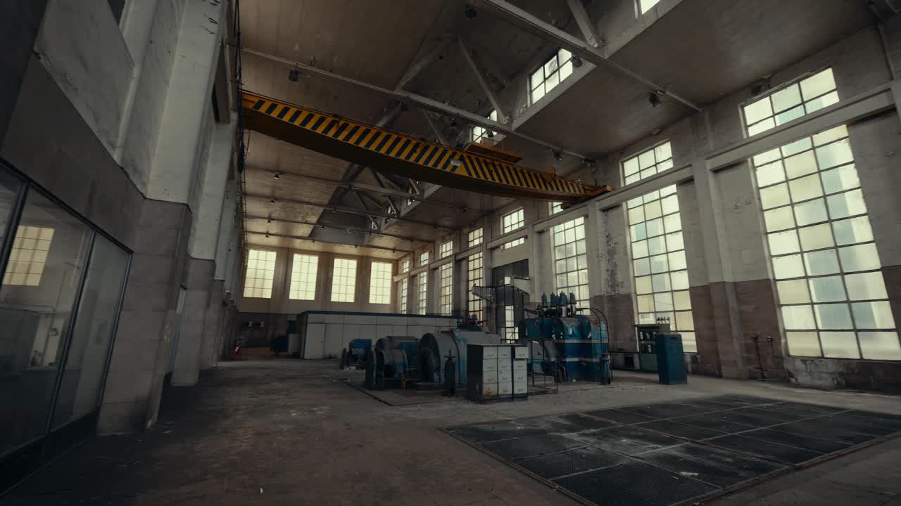 Abandoned Industrial Factory Interior with Large Overhead Crane