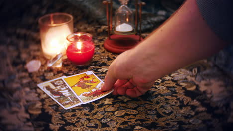 a mystical fortune teller lays out a tarot card spread