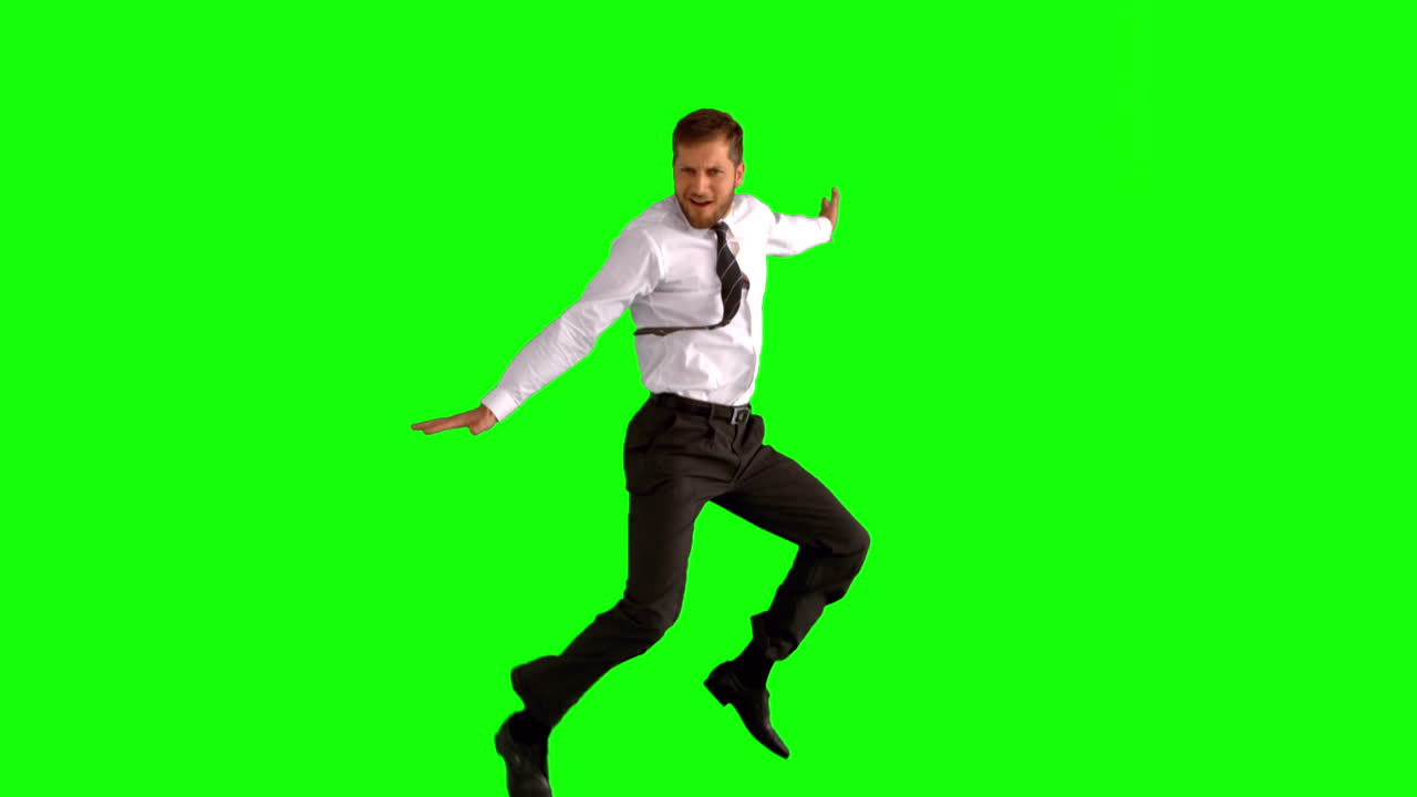 Uomo d'affari che salta
