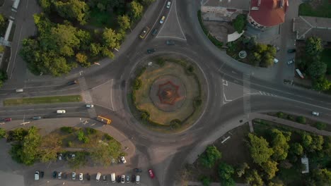 4k aerial view of road with circular cars.