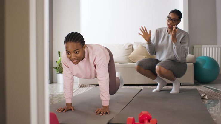 Women doing sports at home