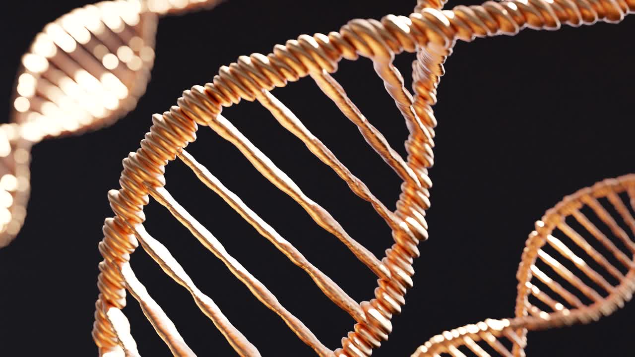 3D animation of gold DNA strands over dark background