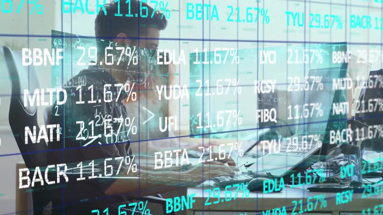 Financial analyst reviewing percentages overlay at desk, answering call and jotting market notes