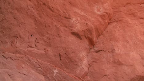 american indian handprints on a wall