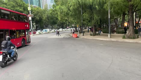 slow-motion-shot-of-the-metrobus-as-it-passes-through-the-paseo-de-la-reforma-in-mexico-city