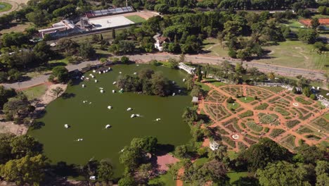 orbit shot of rosedal park and palermo lakes in buenos aires city