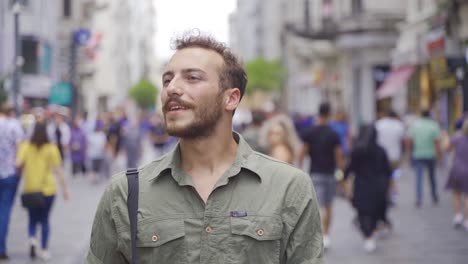 Young-man-walking-happily.