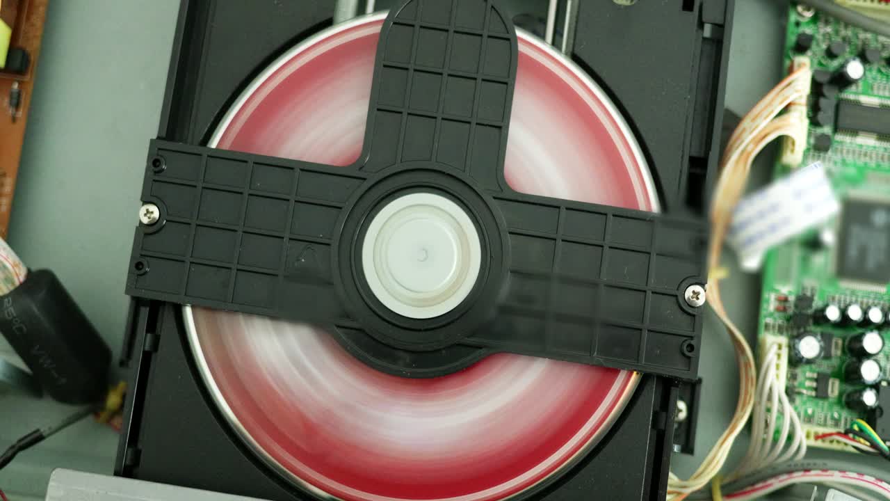 The image showcases a spinning disc in a tech setting highlighting movement and technology.