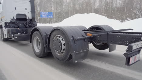 truck chassis on a snowy road in winter