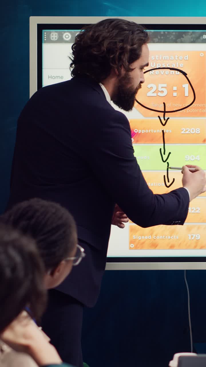 Businessman Presenting Financial Data on Interactive Screen in Office