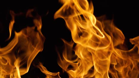 Flames-of-fire-on-black-background-in-slow-motion