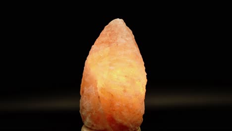 Himalayan-Salt-lamp-360-rotation-on-the-black-background