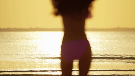 young asian chinese girl in swimwear on beach