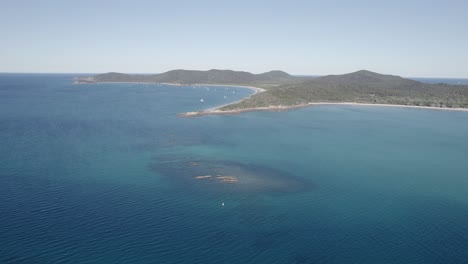 a view of the passage rock reef near putney beach on great keppel island in the capricorn coast, queensland, australia