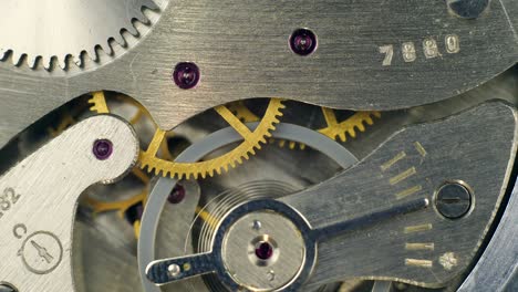 watch mechanism macro loop.old vintage clock mechanism working, closeup shot with soft focus.close up of a internal clock mechanism.vintage watch gears movement macro