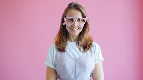 woman wearing heart-shaped glasses