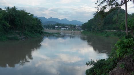 scenic river landscape with mountains and lush vegetation