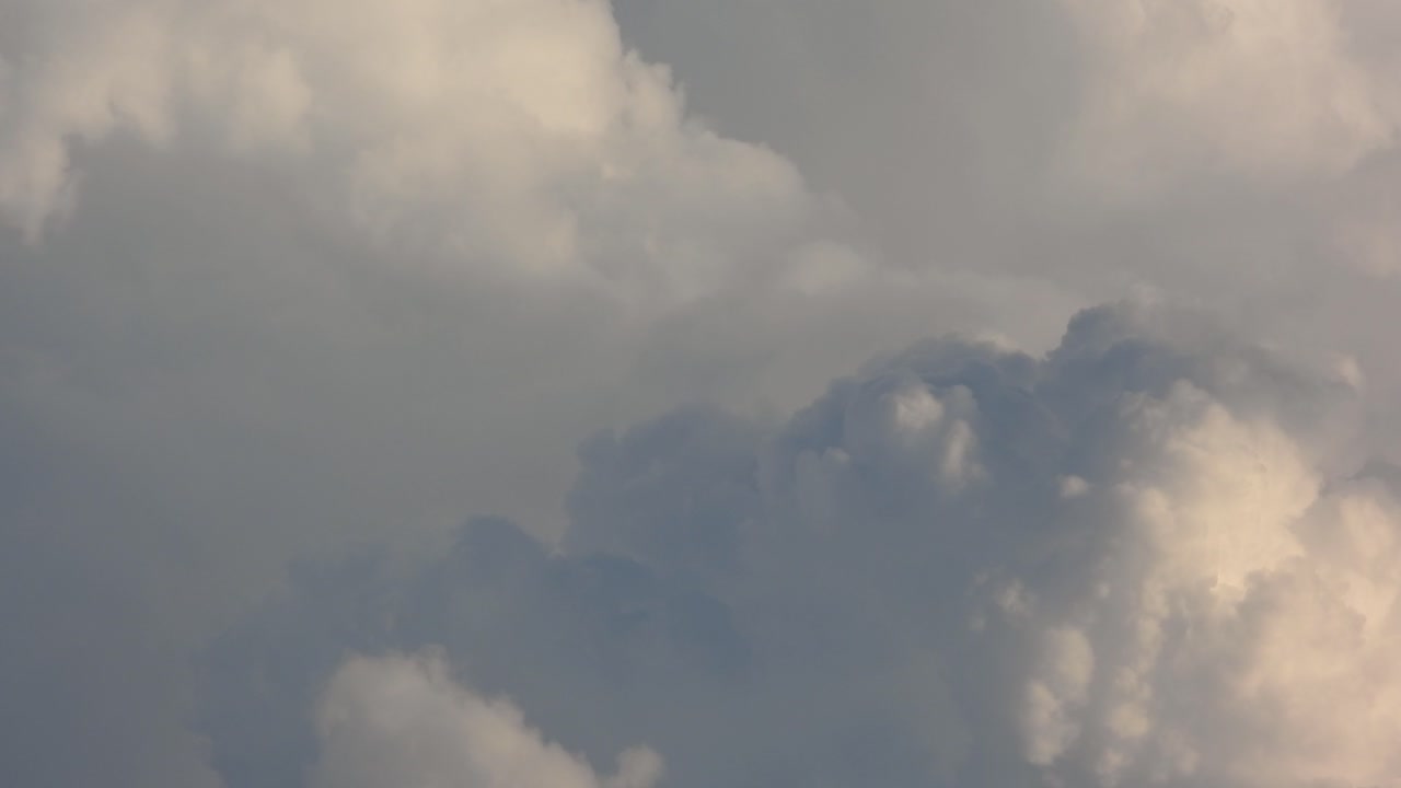 Timelapse of storm clouds forming, flying through clouds