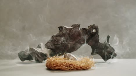 person holding palo santo wood stick in hand, aromatic palo santo burning on black background, smoke spreading around, slow motion video clip, high quality 4k close up footage. high quality 4k footage