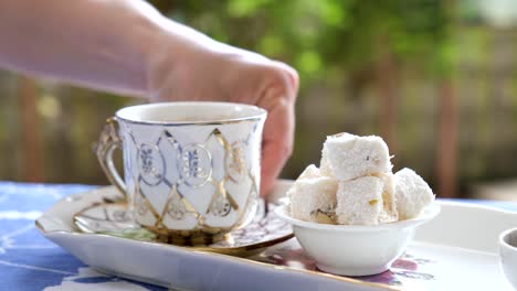 turkish delight and coffee served on the table