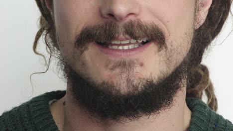 close-up-young-man-mouth-smiling-happy-lower-face-caucasian-male-beard-facial-hair-on-white-background