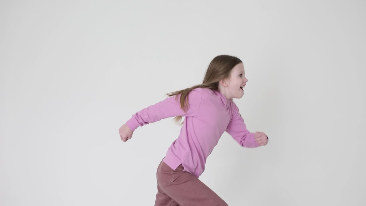 Energetic Young Girl Running and Playing Indoors