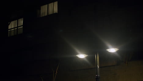 Apartment-house-with-lantern-at-rainy-night