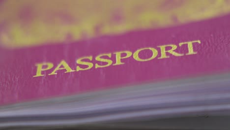 macro close up of british passport identification. international travel document. used for passing through airports and ferry ports