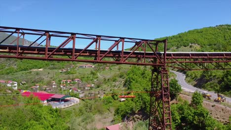 Drone-shot-of-an-emergency-stretcher-is-transporting-an-injured-person-on-a-metal-construction