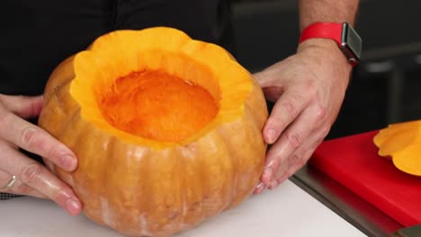 preparing a pumpkin for cooking