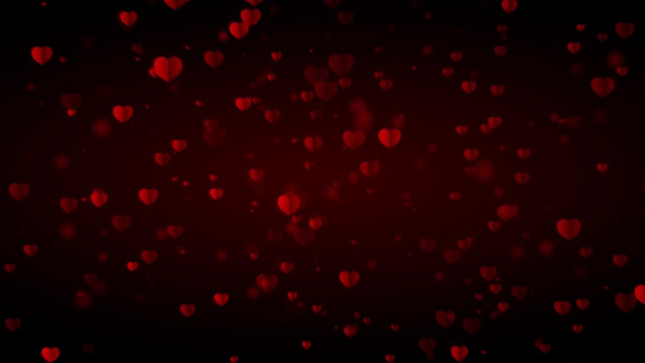 los corazones de amor están cayendo lentamente sobre un fondo oscuro, especialmente para el día de san valentín y el 8 de marzo.