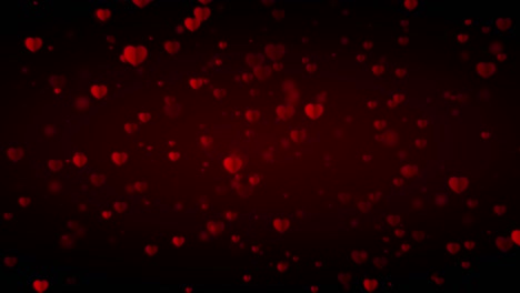 los corazones de amor están cayendo lentamente sobre un fondo oscuro, especialmente para el día de san valentín y el 8 de marzo.