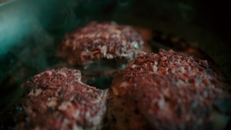 Frying-Three-Burger-Patties-In-A-Pan---Close-Up-Shot