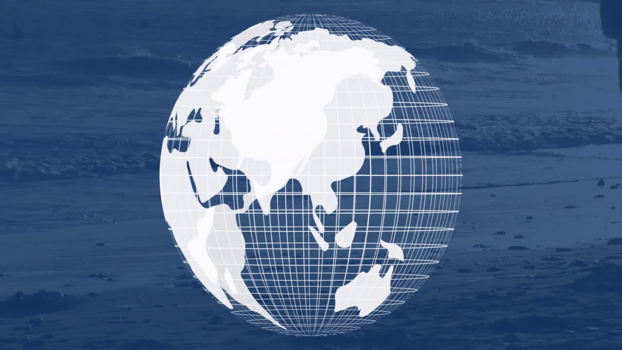 해변에 서 있는 사람의 실루 위에 회전하는 지구 애니메이션