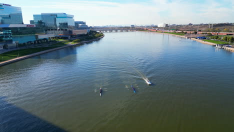 fly over of rowers rowing on tempe town lake located in tempe arizona just outside of phoenix