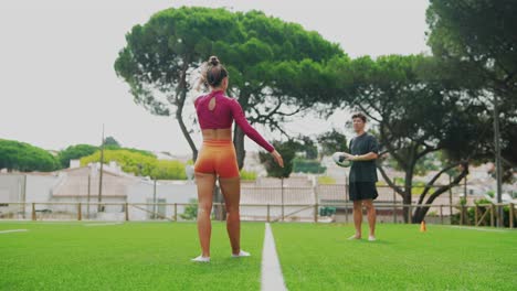 People playing rugby on a field