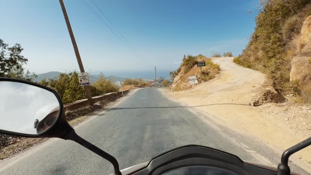 Motorcycle ride on a scenic mountain road