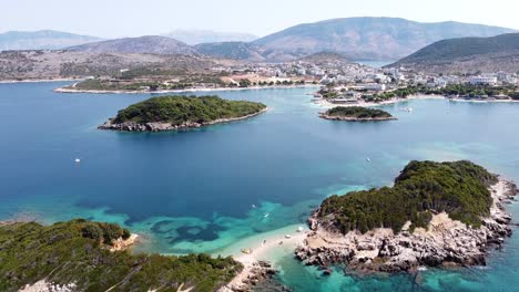 Ksamil-Islands,-Albania---Aerial-of-Small-White-Sandy-Beach-and-Beautiful-Coastline