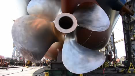 massive ship propeller under inspection: a closer look at maritime engineering and design innovations in cutter technologies for enhanced vessel performance