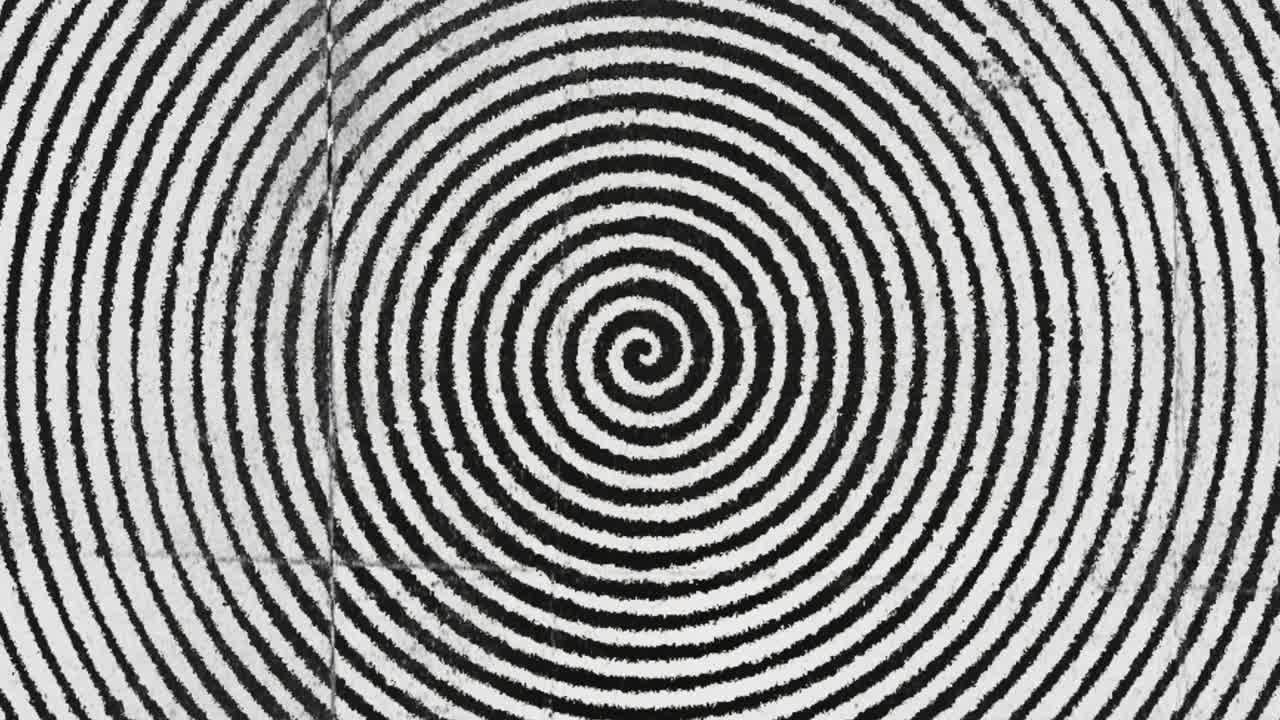 spiral hypnotic vintage black and white line rotating close-up
