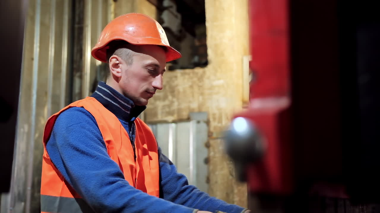 Factory Man Worker. Portrait of industrial worker in action