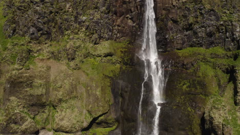 Pull-out-aerial-view-from-close-up-to-wide-angle-of-the-Bjarnafoss-Waterfall-in-Iceland